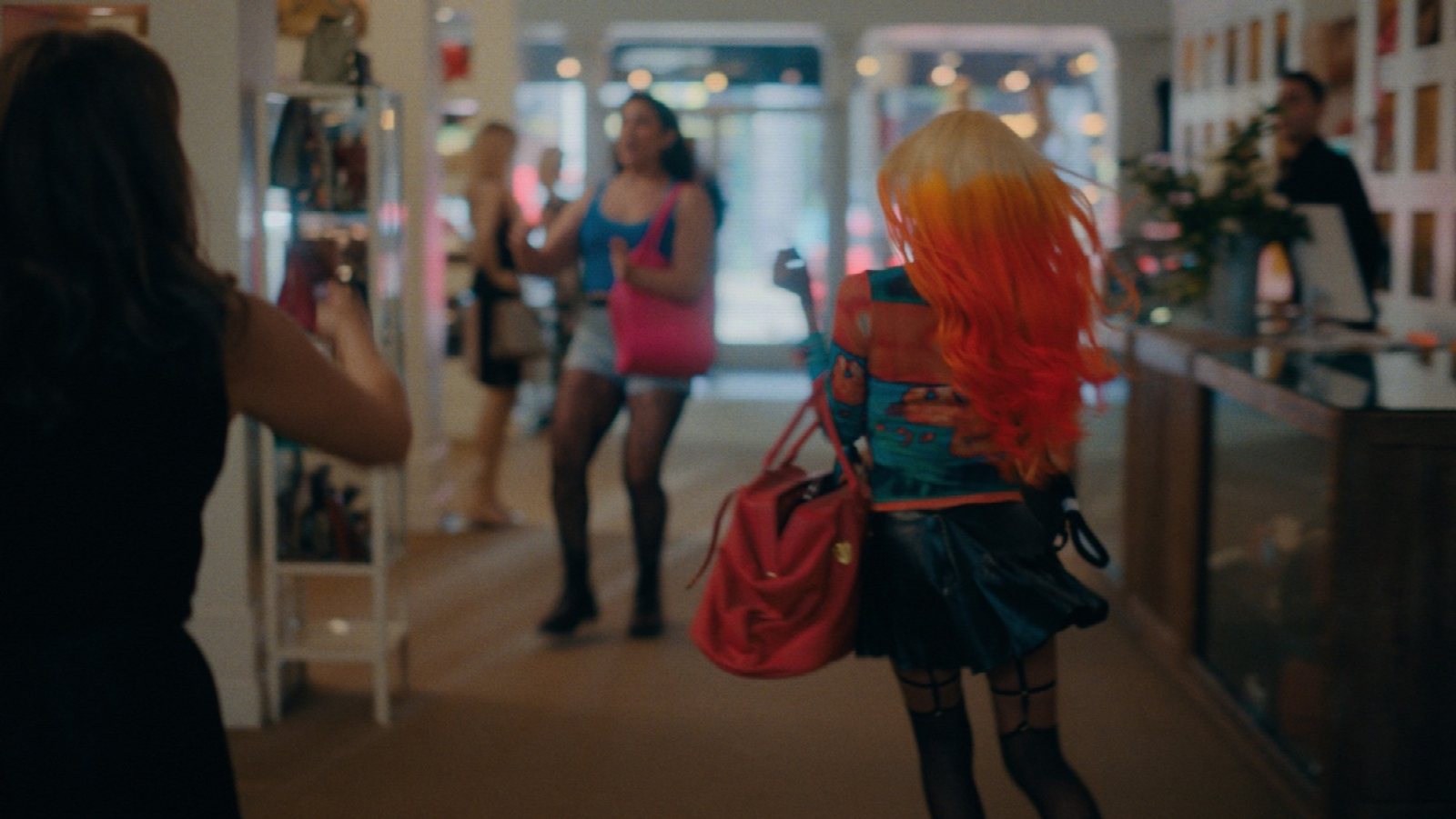 Rainbow Girls heist scene production outside consignment store with crew